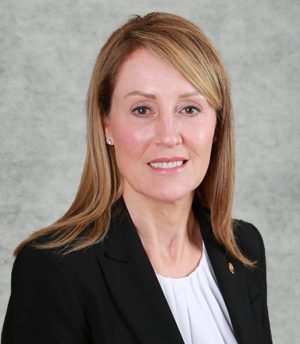 Kathy Grey Background Kathryn J. Burrell CHIEF EXECUTIVE OFFICER Sunstates Security